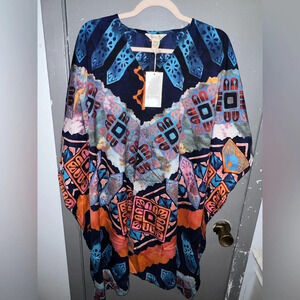 Nwt Gypsie Blue poncho type shirt One size fits most. Beautiful multi color.